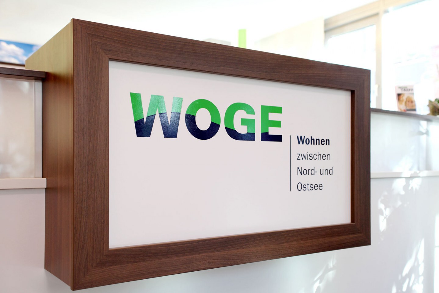 GRÜN ZICOM digitalisiert Zeiterfassung bei der WOGE
